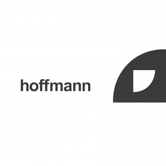 hoffmann is spelled out, lowercase in arial typeface on the lefthandside of a black quater circle with a smaller half cercle in white and oriented in the opposite direction
